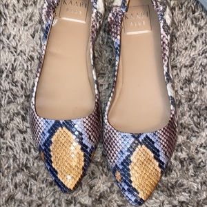 Snakeskin flats never worn